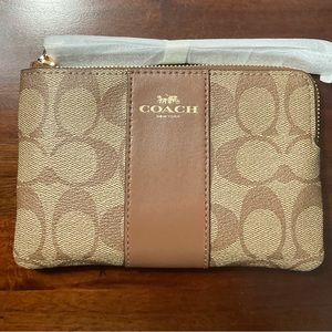 Coach Corner Zip Wristlet In Signature Canvas